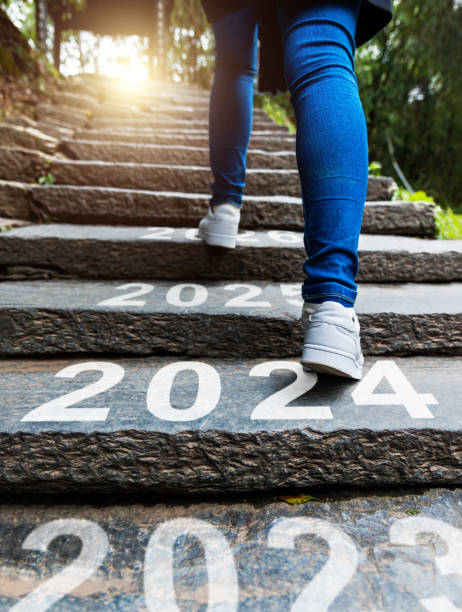 Woman walking up stone stairs front 2023, 2024 to 2025 and 2026 Woman walking up stone stairs front 2023, 2024 to 2025 and 2026 2024 30 stock pictures, royalty-free photos & images