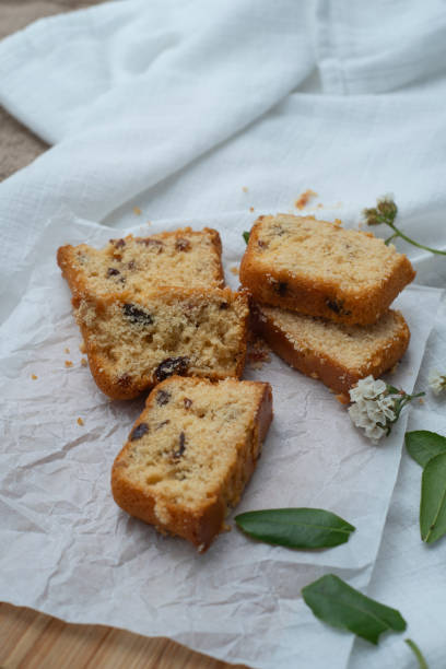 istock Raisin cake cut pieces sliced in white surface on the wooden board 1715176236