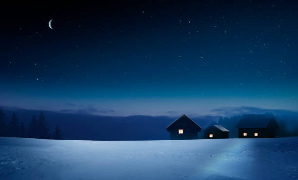istock Illuminated village in a cold winter night 1715182256
