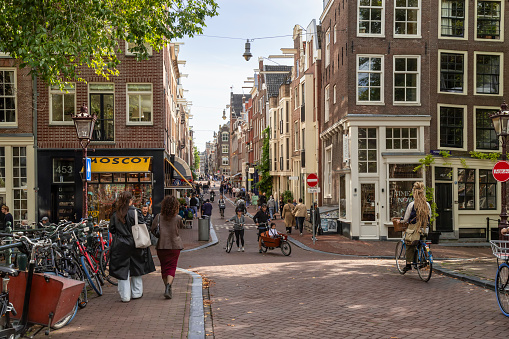 Amsterdam, Netherlands, September 24, 2023; Narrow cozy shopping street - the 9 streets, a picturesque shopping area in the center of Amsterdam.