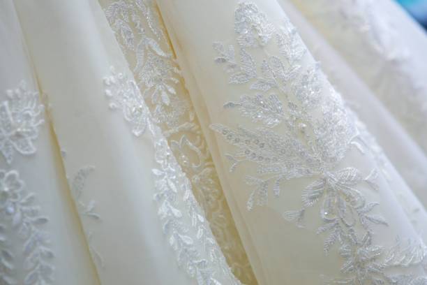 istock Lace and embroidery with beads on fabric 1715198773