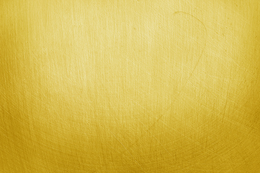 texture of old yellow golden aluminum metal with scratch for background.