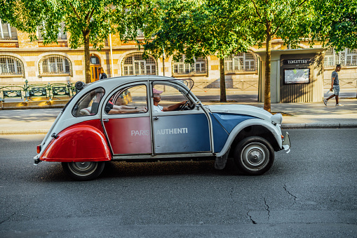 France, Paris - September 10, 2023: Historic Citroën 2CV on the street in central Paris, France