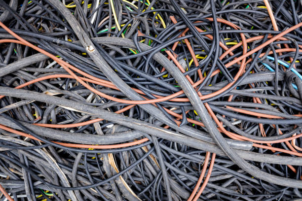 istock Remains of plastic electrical cables abandoned in a field by thieves. 1715214147