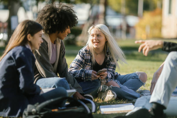 istock Students Studying and Socializing on College Lawn 1715230581