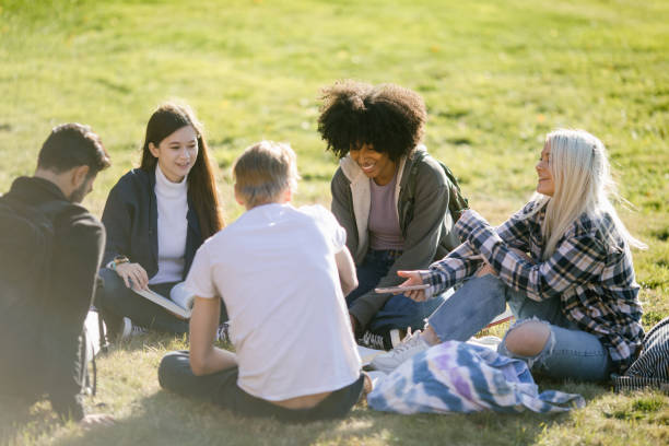 istock Students Studying and Socializing on College Lawn 1715231112