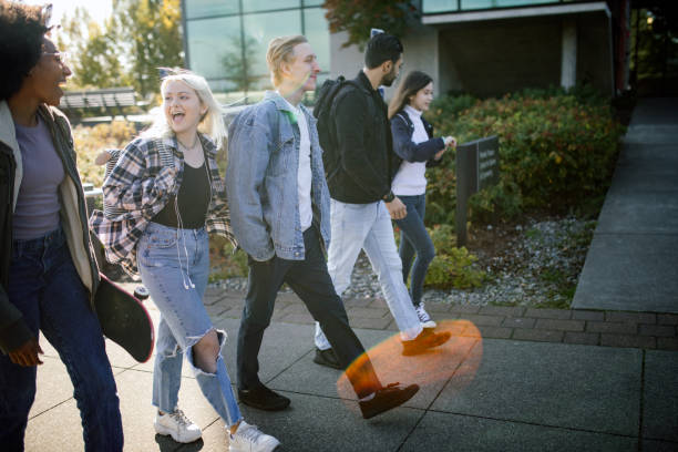istock College Students Talk and Walk on Campus 1715232793