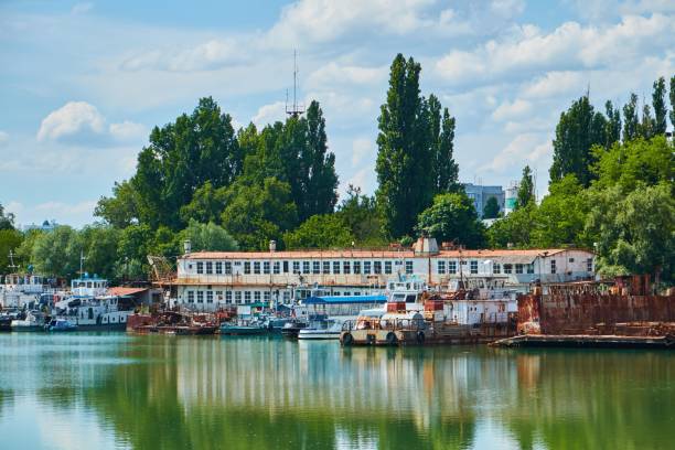 istock A small industrial river port in the city. A river for small navigation. 1715244321