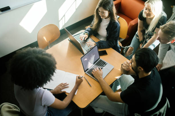 istock College Students Working on Assignments in Classroom 1715251180