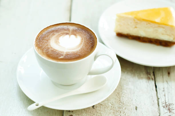 istock Latte coffee with New York cheesecake background. 1715274778