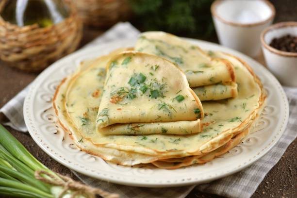 istock Pancakes with green onions and dill. 1715288511