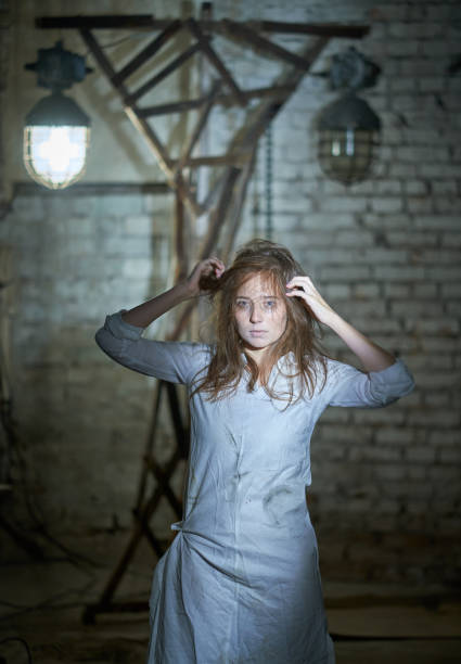 istock Drug addicted female is looking at the camera with despair 1715289632