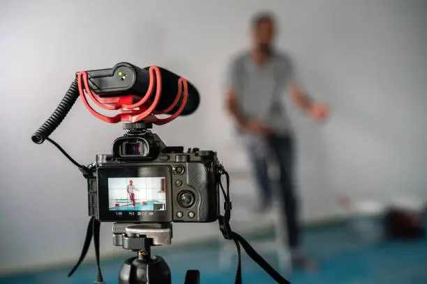 mirrorless camera recording video for social media close up vlogger horizontal still