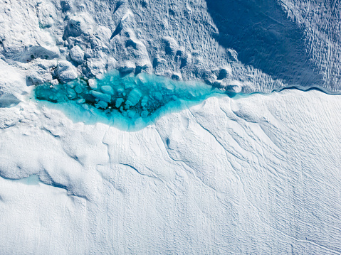 Greenland Ilulissat Icefjord Aerial View. Iceberg and glacier ice in Arctic nature landscape in Greenland. Ilulissat, Disko Bay, Baffin Sea, Greenland.