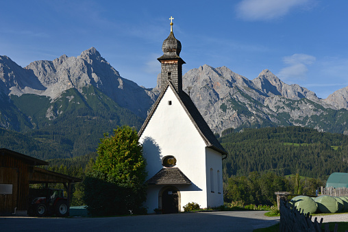 typical catholic chapel in the Austrian village of Maria Alm in the Alps