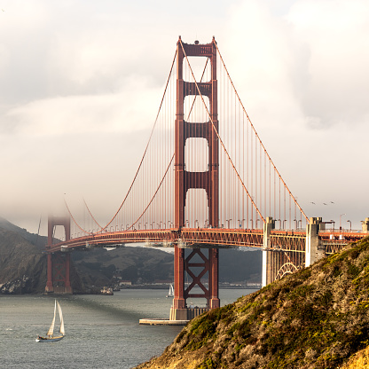 Golden Gate bridge with chain fencing and San Francisco Bay, CA