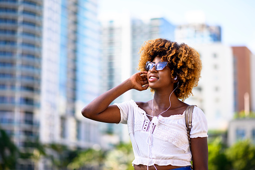 Young woman spending time in Miami. Portraits of a millennial African American woman.