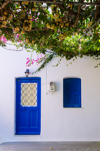 Blue door to white house in Kalymnos Greece
