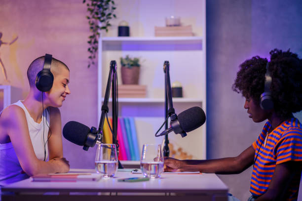istock A multiracial journalist is interviewing a podcast guest. 1715401958