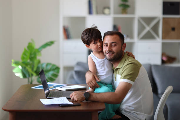 istock Father trying to work from home 1715415602