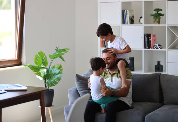 istock Father trying to work from home 1715416170
