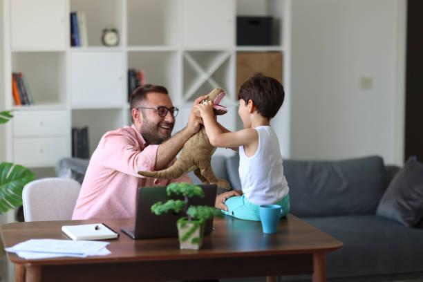 istock Father trying to work from home 1715417252