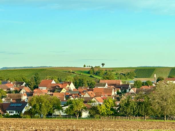 istock Village surrounded by vineyards 1715436452