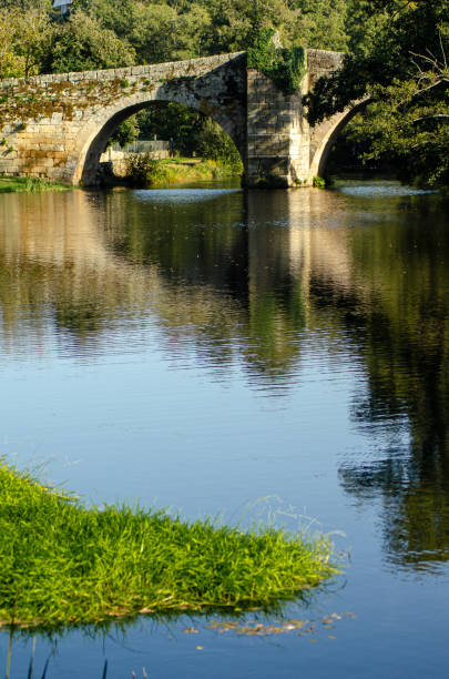 istock medieval bridge of Allariz at sundown 1715445529