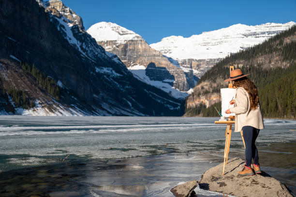 istock Artist painting in nature 1715445555