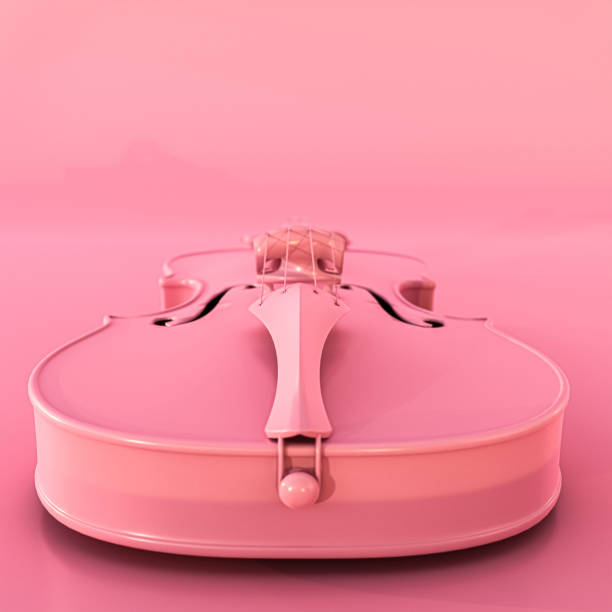istock pink violin isolated on pink background 1715495590