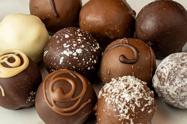 istock Chocolate truffles filled with almond ganache and nuts 1715514115
