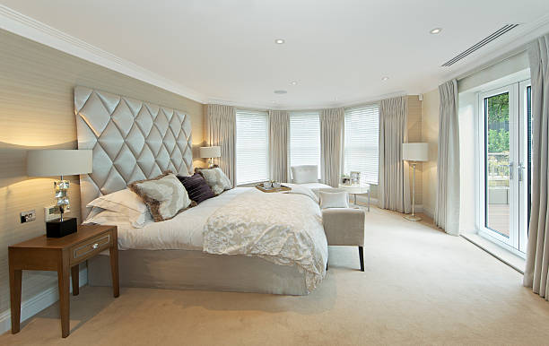 istock A clean, neat, and decorative bedroom full of sunlight  171551534