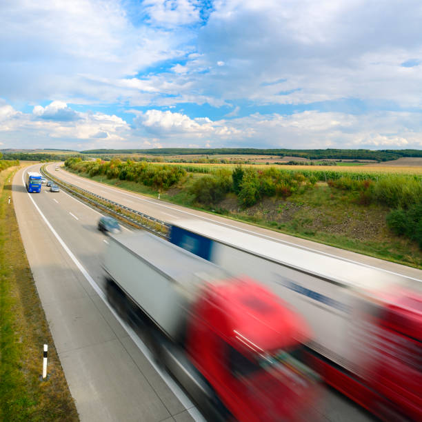istock Trucks and Cars Driving on Motorway 171551630