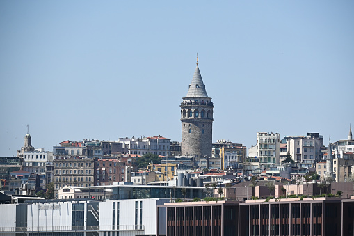 Galata Tower. The tower, built by the Genoese, is located in Istanbul near the Golden Horn Bay.