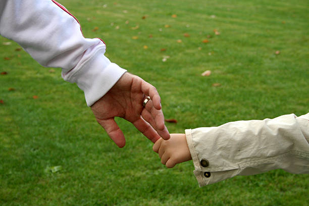 holding hands stock photo