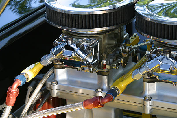 Carburetor From Car Engine Carburetor from car engine. Air cleaner and intake manifold visible. Lots of detail and color on the linkage and parts. throttle stock pictures, royalty-free photos & images