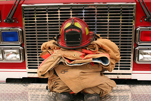 Firefighter Gear on a Fire Truck stock photo