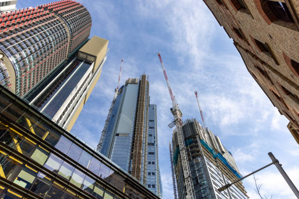 istock Construction of skyscrapers in the city, background with copy space 1715552232