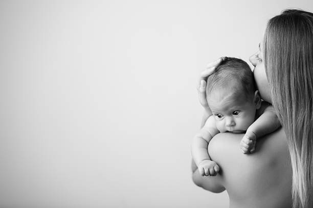 istock Baby in mother hand 171555493