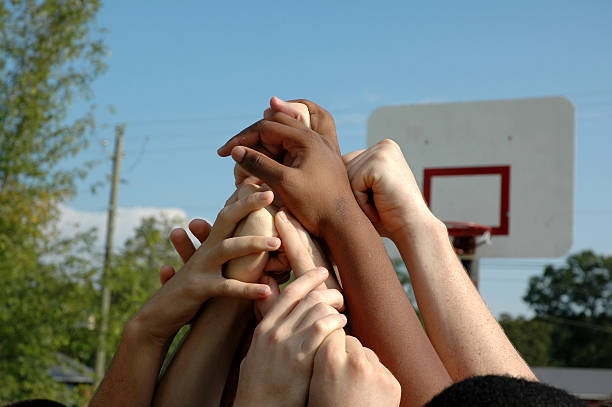 après le match - human hand reaching black white photos et images de collection