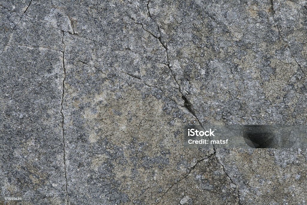 Flat rock superficie con grietas - Foto de stock de Con textura libre de derechos