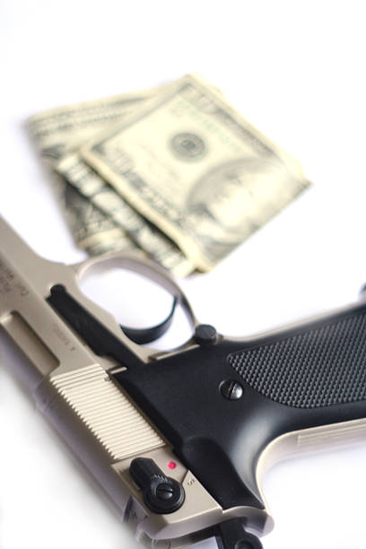 istock Guns and money 171555682