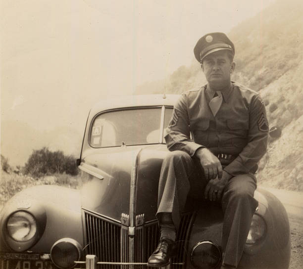 Old Photo-Officer on car stock photo