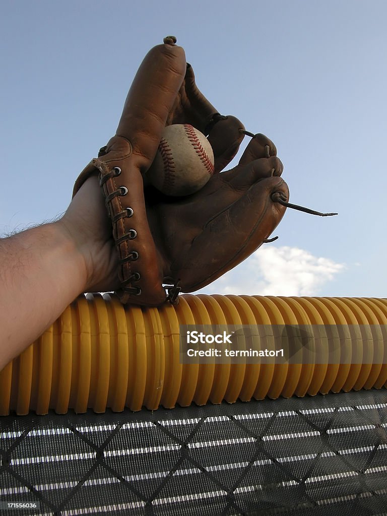 Baseball Glove Catch catching a baseball that was nearly a homerunSee more related images in my Softball & Baseball lightbox: Baseball - Ball Stock Photo