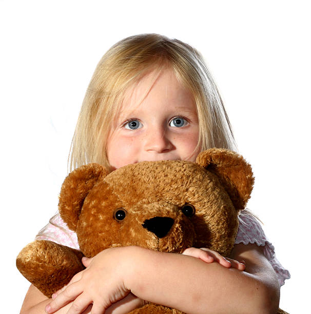 istock girl with teddy bear 171556108