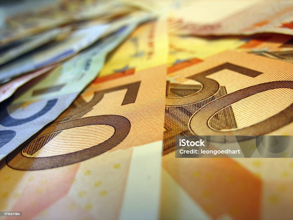 euro banknotes, fifty "euro currency, focus on 50, blurred in surrounding. nice for offering discounts of with financial subjects.A little arty with the blurring." Euro Symbol Stock Photo