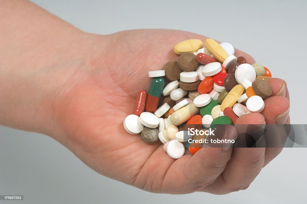 Tenere i farmaci - Foto stock royalty-free di Assicurazione