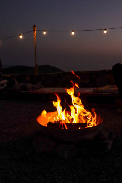 istock mountain camp site with bonfire on cold autumn night 1715572755