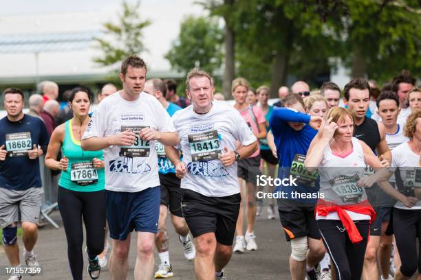 Foto de Corredores De Meia Maratona e mais fotos de stock de 60 Anos - 60 Anos, Adulto, Atleta