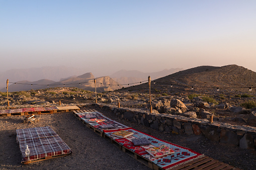 Mountain Top Camp site with bonfire pit and cushions at Ras al Khaimah Jebel Jais